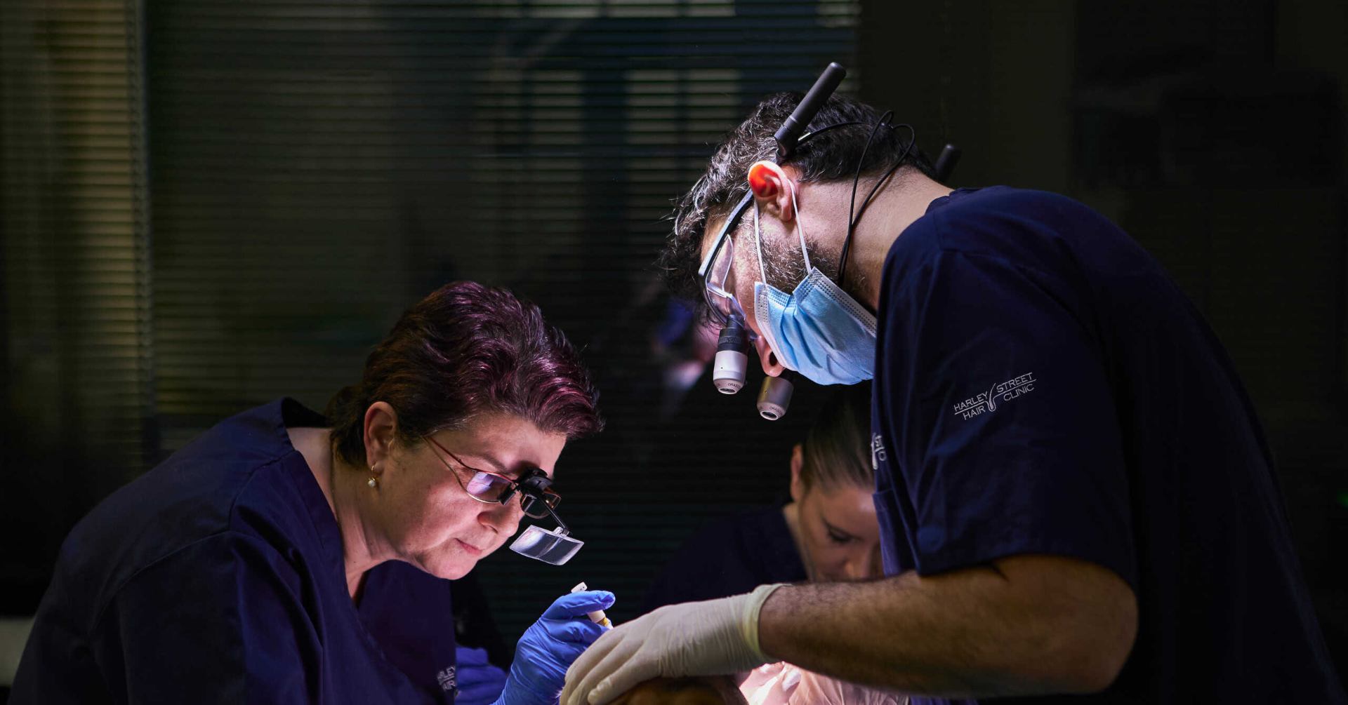 Harley Street Hair Clinic surgical team performing an FUE hair transplant